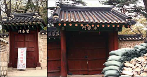 봄을 바라본다는 망춘문 앞에는 "화재예방"이라는 펼침막이 놓여 있고, 창경궁으로 통하는 영춘문 앞에는 포대와 돌들이 쌓여 있다. 