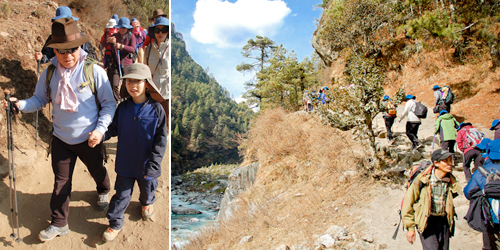 엄 대장이 대원중 최연소인 박창희 군(12)의 손을 잡고 함께 걷고 있다.(왼쪽) 계곡을 따라 산을 오르고 있는 푸르메 네팔 미소원정대원들(오른쪽)