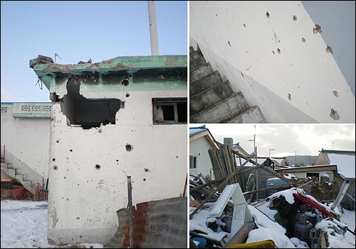 변진식 씨의 집. 그의 집 앞에 포탄이 떨어졌다고 한다(오른쪽 아래 사진). 때문에 창고나 집 벽에는 파편 자국이 남았다.