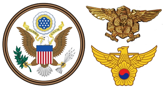 좌측은 미국 행정부의 공통 상징이며 국장인 발드 이글(독수리)이고 우측 위는 대한민국 소방의 상징인 새매, 그 아래는 우리나라 경찰의 상징인 참수리다. 
