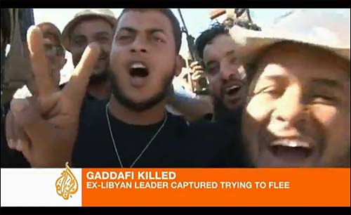 카다피 사망 소식에 기뻐하는 리비아 시민들.