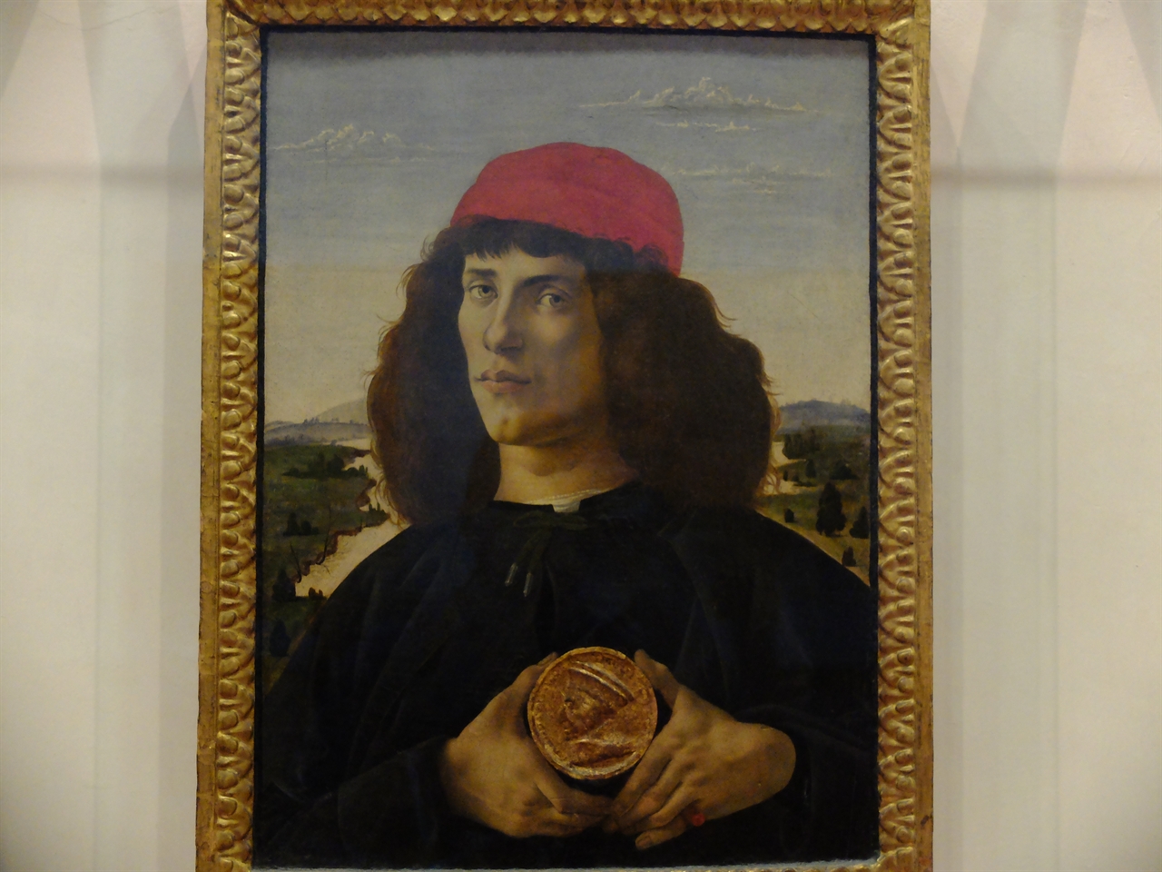 보티첼리, '메달을 든 젊은이의 초상', 피렌체 우피치 미술관. '위대한 로렌초'로 알려진 젊은이의 초상입니다. 