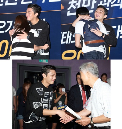  지난 29일 서울 왕십리 CGV에서 진행된 유아인의 프리허그 현장. 영화 <베테랑>으로 천만 관객 기록을 경험한 유아인이 일일이 관객들과 포옹하고 선물을 나눠줬다.