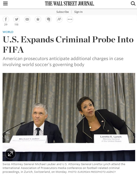 FIFA 부패사건과 관련한 린치 미 법무장관과 라우버 스위스 검찰총장의 공동 기자회견 소식을 전한 월스트리트 갈무리.