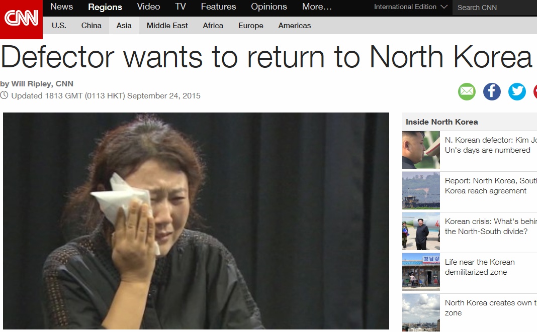 탈북자 김련희씨가 다시 북한으로 돌아가고 싶다고 호소하며 흐느끼고 있다.(CNN 보도화면 갈무리)