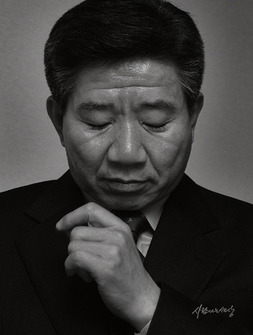 황문성 작가가 인터뷰 중에 찍은 노무현 대통령의 사진 
