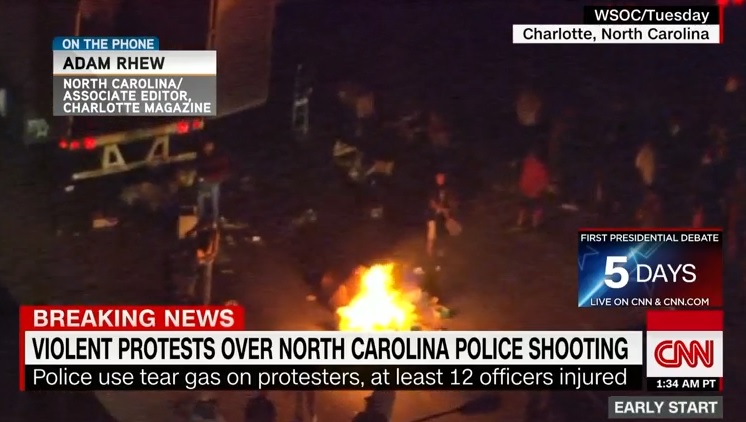 미국 살럿의 흑인 피살 사건에 대한 항의 시위를 보도하는 CNN 뉴스 갈무리.