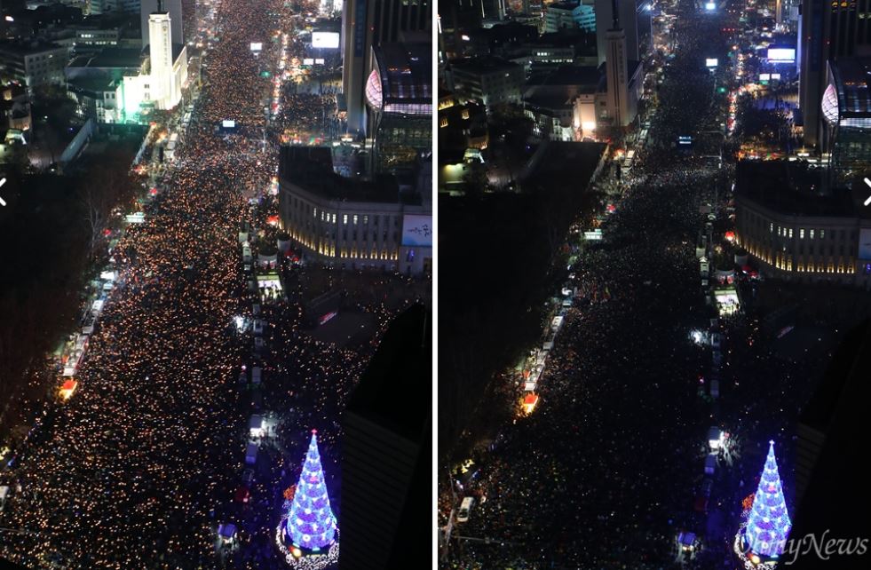 
3일 오후 서울 광화문광장에서 열린 '촛불의 선전포고-박근혜 즉각 퇴진의 날 6차 범국민행동'에서 수많은 시민들이 '세월호 7시간'을 밝히자는 의미로 7시에 맞춰 소등을 하고 있다. 
