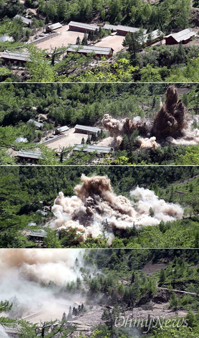 24일 북한 핵무기연구소 관계자들이 함경북도 길주군 풍계리 핵실험장 폐쇄를 위한 폭파 작업을 했다. 사진은 지휘소와 건설노동자 막사가 폭파되는 모습.