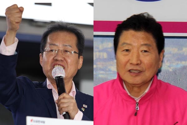 자유한국당 홍준표 대표와 무소속 안상수 창원시장 후보.
