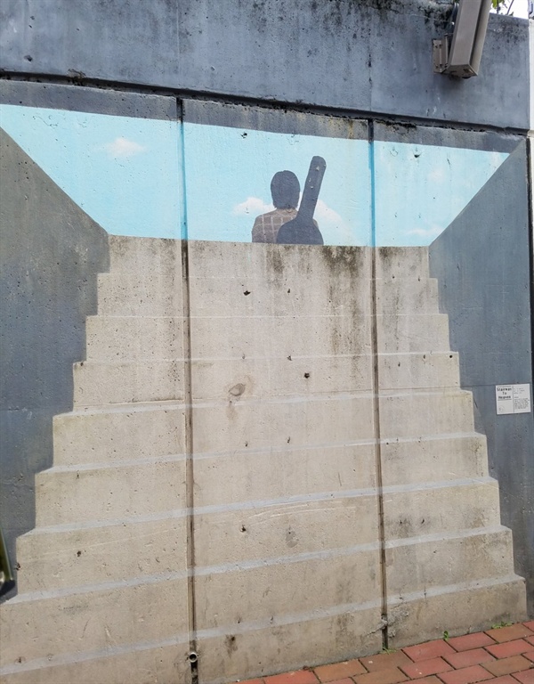 김광석의 대표곡 가운데 하나인 '서른 즈음에'를 그린 벽화