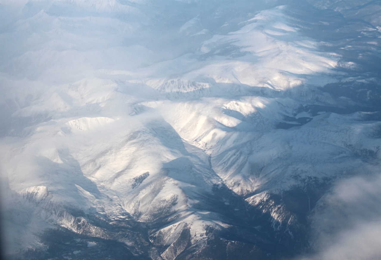 비행중 찍은 시베리아 벌판의 설경 모습