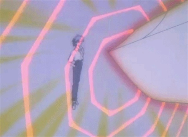 <에반게리온>이라는 애니메이션의 한 장면. ‘에반게리온 초호기’의 거대 칼날을 마음의 벽 하나만으로 거뜬히 막아내고 있는 ‘나기사 카오루(인간형 사도)’의 모습.