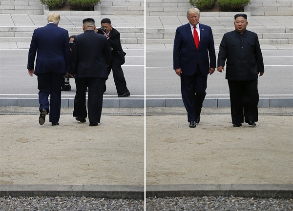 도널드 트럼프 미국 대통령과 북한 김정은 국무위원장이 6월 30일 오후 판문점 군사분계선을 넘어 북측으로 함께 걸어갔다 다시 되돌아오고 있다.