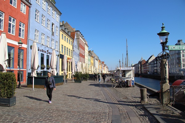 The landscape on April 6 of Nyhaun, the largest tourist attraction in Copenhagen, the capital of Denmark.  There are no tourists, so people are rare.