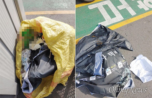  19일 CJ대한통운 부산 우암터미널에 설치된 과로사 택배노동자 추모분향소와 영정이 강제철거돼 마대에 버려졌다.