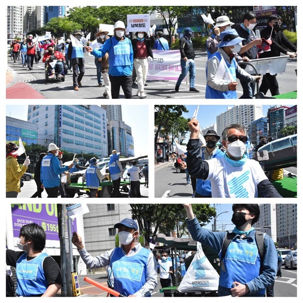 대구 시내를 지나며 행진 참가들이 대구 시내를 행진하며 남북철도 연결을 호소하고 있다.