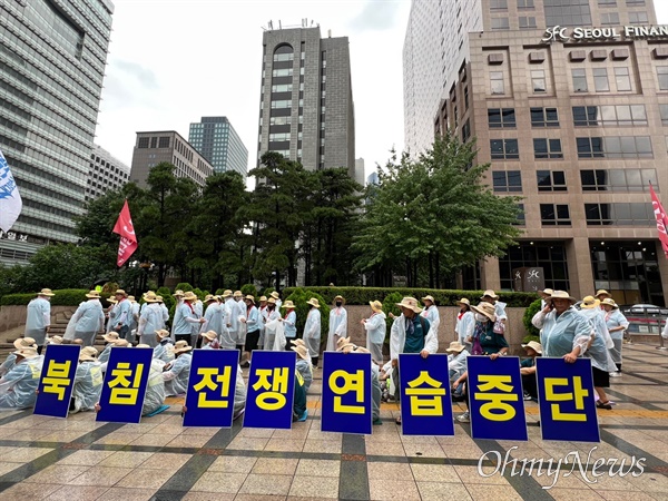 12일 서울 광화문에서 열린 "한반도 평화실현, 범국민대회”