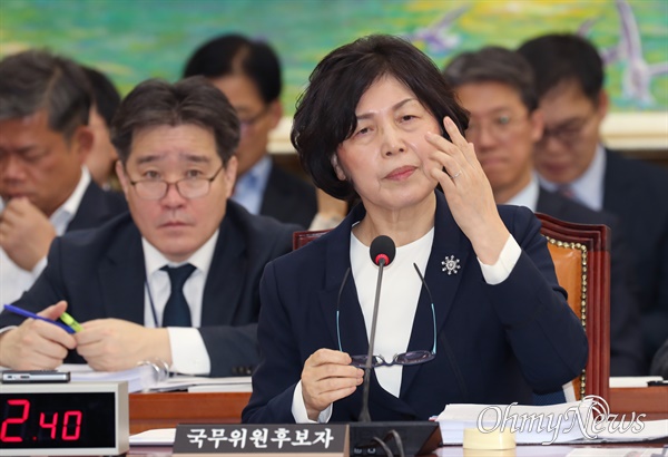 강정애 국가보훈부 장관 후보자가 21일 서울 여의도 국회에서 열린 인사청문회에서 의원 질의를 듣고 있다. 
